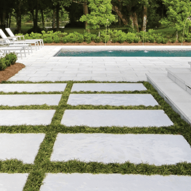 Sleek Pool with Grass & Concrete Pavers